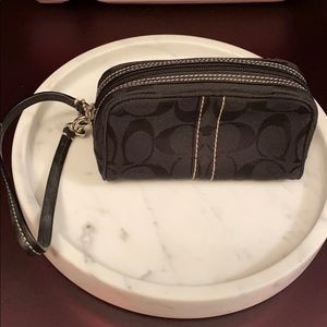 Coach purse with dust cloth